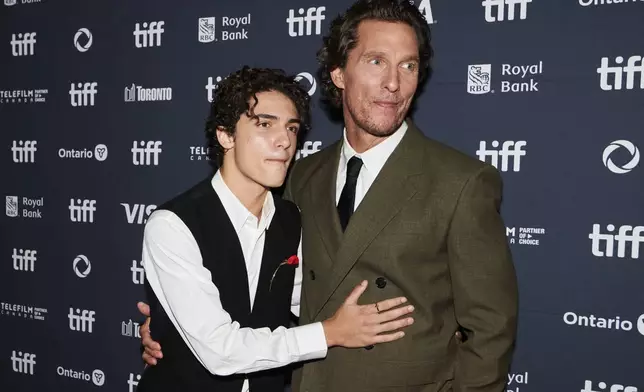 Levi McConaughey, left, and Matthew McConaughey are photographed on the red carpet for the film "The Lost Bus" during the Toronto International Film Festival in Toronto on Friday, Sept. 5, 2025. (Sammy Kogan/The Canadian Press via AP)
