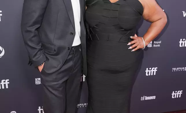 Miles Teller, left, and Da'Vine Joy Randolph attend the premiere of "Eternity" during the Toronto International Film Festival on Sunday, Sept. 7, 2025, at Roy Thomson Hall in Toronto. (AP Photo/Chris Pizzello)