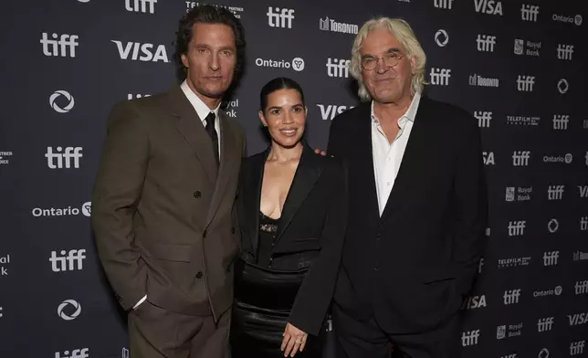 Matthew McConaughey, from left, America Ferrera, and director Paul Greengrass attend the premiere of "The Lost Bus" at the Princess of Wales Theatre during the Toronto International Film Festival on Friday, Sept. 5, 2025, in Toronto. (AP Photo/Chris Pizzello)