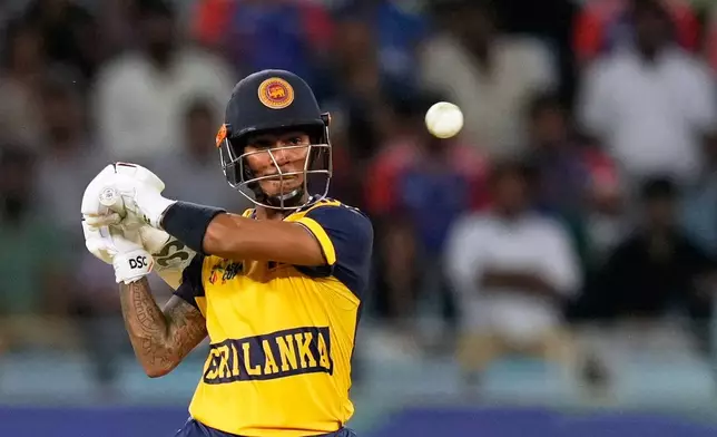 Sri Lanka's Pathum Nissanka plays a shot during the Asia Cup cricket match between India and Sri Lanka at Dubai International Cricket Stadium, United Arab Emirates, Friday, Sept. 26, 2025. (AP Photo/Altaf Qadri)