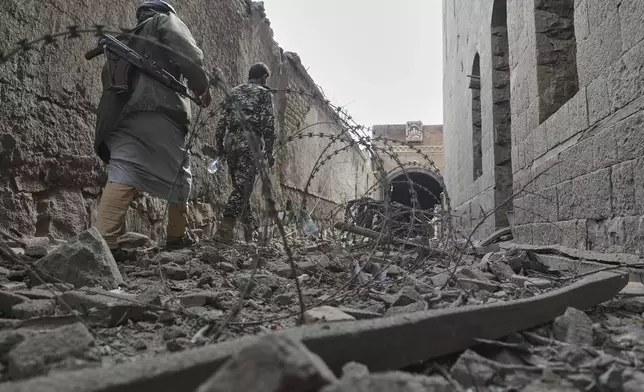 People inspect the damage at the National Museum, following the Israeli airstrikes on Wednesday in Sanaa, Yemen, Thursday, Sept. 11, 2025. (AP Photo/Osamah Abdulrahman)