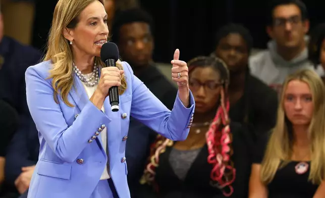 Democrat Mikie Sherrill responds to questions during the first general election gubernatorial debate with Republican opponent Jack Ciattarelli. Sunday, Sept. 21, 2025, in Lawrenceville, N.J. (AP Photo/Noah K. Murray)