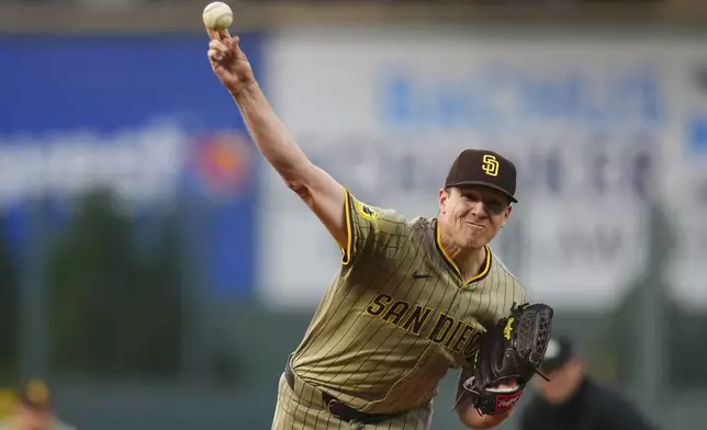San Diego Padres starting pitcher Nick Pivetta throws to the plate against the Colorado Rockies during the first inning of a baseball game Friday, Sept. 5, 2025, in Denver. (AP Photo/Jack Dempsey)