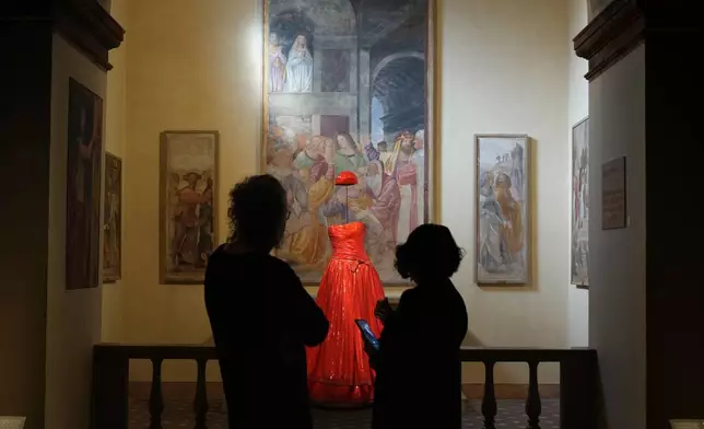 A Giorgio Armani's creation is displayed during the exhibition "Giorgio Armani - 50 Years" opened to the public at the Pinacoteca di Brera in Milan, Italy, Wednesday, Sept. 24 2025. (AP Photo/Antonio Calanni)