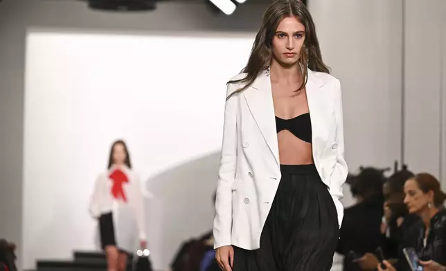 A model walks the runway during the Ralph Lauren Spring 2026 fashion show as part of New York Fashion Week on Wednesday, Sept. 10, 2025, in New York. (Photo by Evan Agostini/Invision/AP)