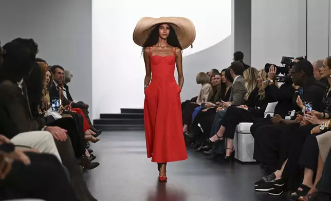 A model walks the runway during the Ralph Lauren Spring 2026 fashion show as part of New York Fashion Week on Wednesday, Sept. 10, 2025, in New York. (Photo by Evan Agostini/Invision/AP)