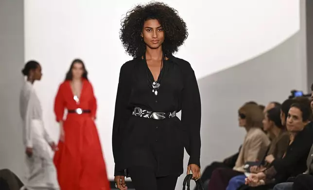 A model walks the runway during the Ralph Lauren Spring 2026 fashion show as part of New York Fashion Week on Wednesday, Sept. 10, 2025, in New York. (Photo by Evan Agostini/Invision/AP)