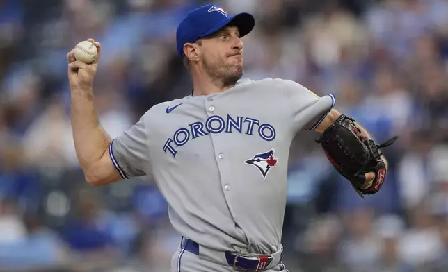 Toronto Blue Jays starting pitcher Max Scherzer throws during the first inning of a baseball game against the Kansas City Royals, Friday, Sept. 19, 2025, in Kansas City, Mo. (AP Photo/Charlie Riedel)