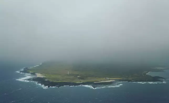 FILE - Clouds from a passing storm cover the peninsula of Kalaupapa, Hawaii, July 19, 2023. (AP Photo/Jessie Wardarski, File)