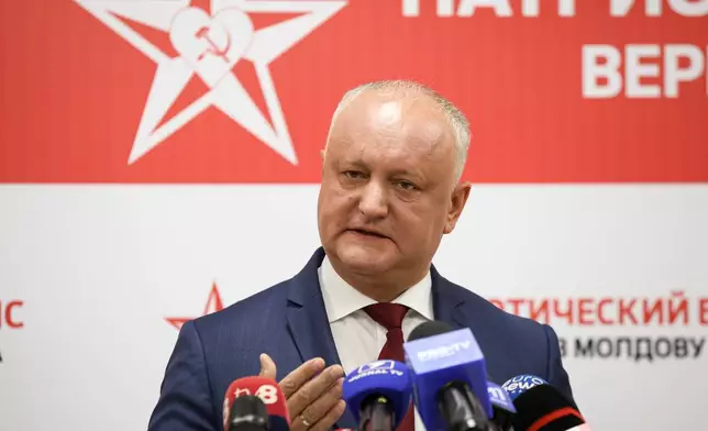Former Moldovan President Igor Dodon leader of the Russia-friendly Patriotic Electoral Bloc, or BEP, speaks to the media during a press briefing after the polls closed for the parliamentary election, in Chisinau, Moldova, Sunday, Sept. 28, 2025. (AP Photo/Aurel Obreja)