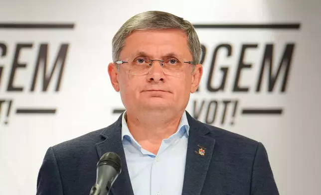 Igor Grosu, president of Moldova's parliament and leader of the pro-EU Party of Action and Solidarity speaks to the media during a press briefing after the polls closed for the parliamentary election, in Chisinau, Moldova, Sunday, Sept. 28, 2025. (AP Photo/Vadim Ghirda)