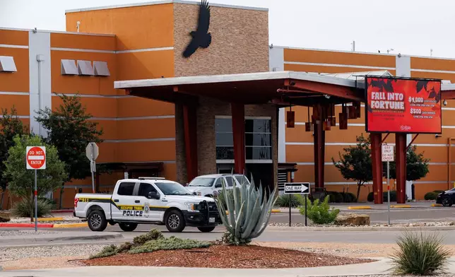 Security and police vehicles surround the entrance to Kickapoo Lucky Eagle Casino in Eagle Pass, Texas, Monday, Sept. 29, 2025, after a deadly shooting at the casino late Saturday night. (Sam Owens/The San Antonio Express-News via AP)