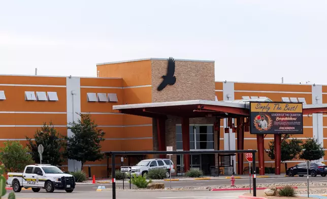 Security and police vehicles surround the entrance to Kickapoo Lucky Eagle Casino in Eagle Pass, Texas, Monday, Sept. 29, 2025, after a deadly shooting at the casino late Saturday night. (Sam Owens/The San Antonio Express-News via AP)