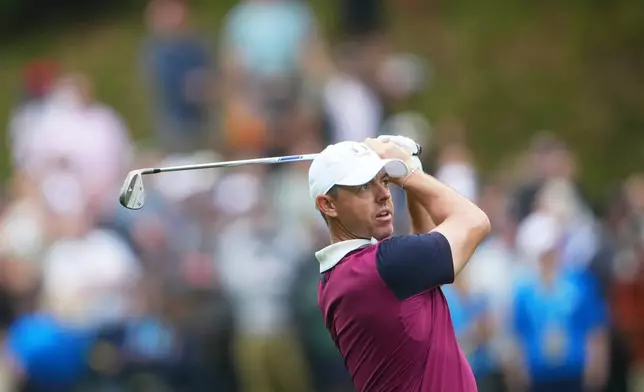 Europe's Rory McIlroy plays on the fifth hole during a practice round at the Ryder Cup golf tournament, Thursday, Sept. 25, 2025, on the Bethpage Black golf course, in Farmingdale, N.Y. (AP Photo/Lindsey Wasson)
