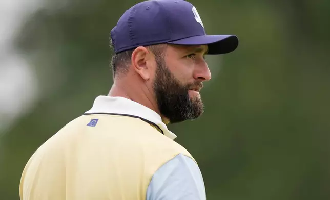 Europe's Jon Rahm, of Spain, watches on the 12th hole during a practice round for the Ryder Cup golf tournament, Wednesday, Sept. 24, 2025, on the Bethpage Black golf course, in Farmingdale, N.Y. (AP Photo/Matt Slocum)