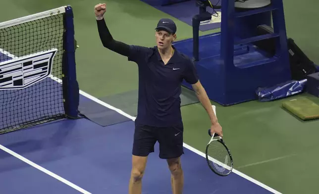 Jannik Sinner, of Italy, reacts after defeating Felix Auger-Aliassime, of Canada, during the men's singles semifinals of the U.S. Open tennis championships, Friday, Sept. 5, 2025, in New York. (AP Photo/Seth Wenig)