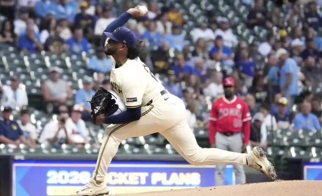 Milwaukee Brewers' Freddy Peralta throws during the first inning of a baseball game against the Los Angeles Angels Tuesday, Sept. 16, 2025, in Milwaukee. (AP Photo/Morry Gash)