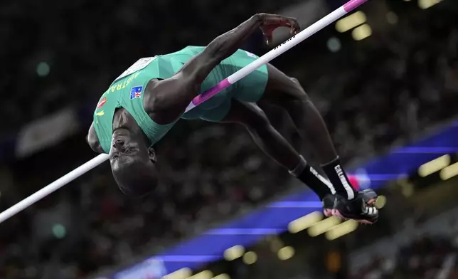 Australia's Yual Reath makes an attempt in the men's high jump final at the World Athletics Championships in Tokyo, Tuesday, Sept. 16, 2025. (AP Photo/Matthias Schrader)