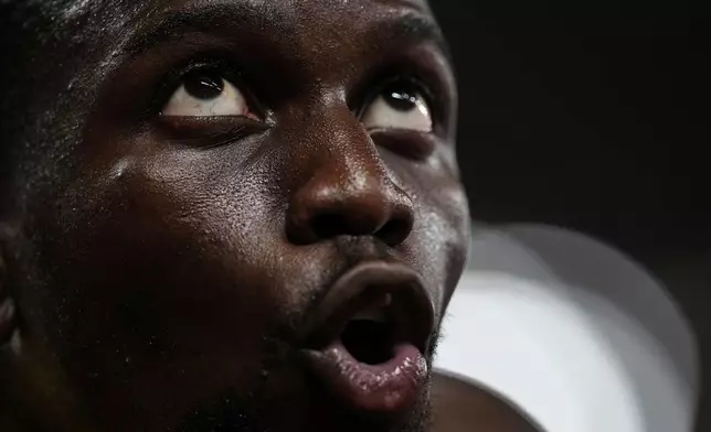 Jamaica's Demario Prince reacts after a men's 110 meters hurdles semifinal at the World Athletics Championships in Tokyo, Tuesday, Sept. 16, 2025. (AP Photo/Petr David Josek)