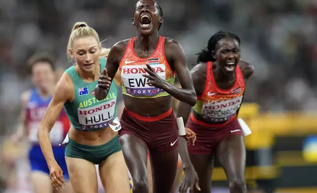 Kenya's Dorcus Ewoi reacts after taking the silver in the women's 1,500 meters final at the World Athletics Championships in Tokyo, Tuesday, Sept. 16, 2025. (AP Photo/Petr David Josek)