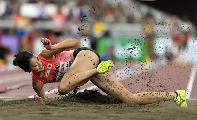 Japan's Maoko Takashima makes an attempt in the women's triple jump qualification at the World Athletics Championships in Tokyo, Tuesday, Sept. 16, 2025. (AP Photo/Matthias Schrader)