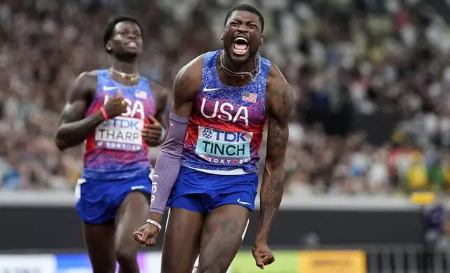 United States' Cordell Tinch wins the gold in the men's 110 meters hurdles final at the World Athletics Championships in Tokyo, Tuesday, Sept. 16, 2025. (AP Photo/Petr David Josek)