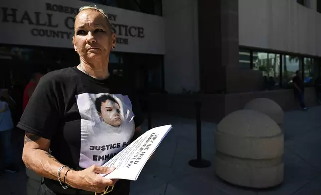 Geena Ayala, an advocate for child protection and justice for Emmanuel Haro, stands outside Superior Court, Thursday, Sept. 4, 2025, in Riverside, Calif., after the court hearing for Jake Haro and his and his wife Rebecca Haro, who are charged with the murder of their son Emmanuel Haro and making a false report. (Anjali Sharif-Paul/The Orange County Register via AP)