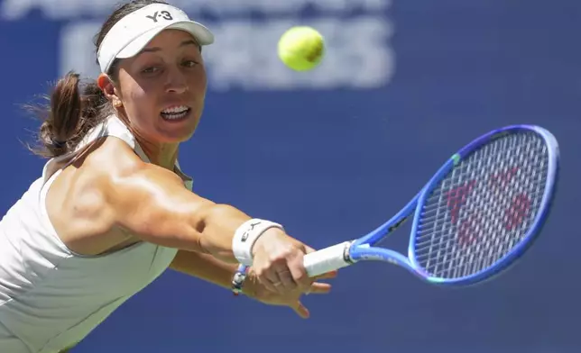 Jessica Pegula, of the United States, returns a shot to Barbora Krejcikova, of the Czech Republic, during the quarterfinal round of the US Open tennis championships, Tuesday, Sept. 2, 2025, in New York. (AP Photo/Kirsty Wigglesworth)