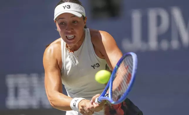 Jessica Pegula, of the United States, returns a shot to Barbora Krejcikova, of the Czech Republic, during the quarterfinal round of the US Open tennis championships, Tuesday, Sept. 2, 2025, in New York. (AP Photo/Kirsty Wigglesworth)