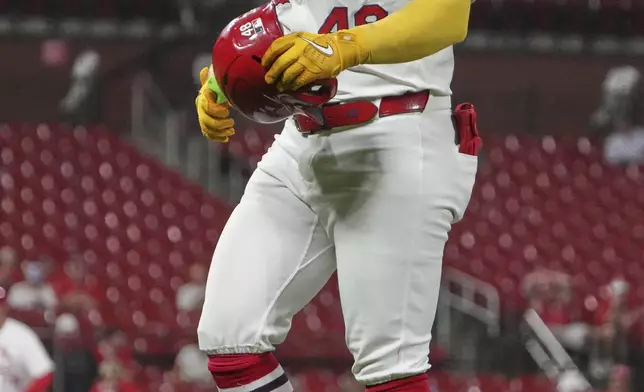 St. Louis Cardinals' Ivan Herrera walks off the field following a baseball game against the Cincinnati Reds Monday, Sept. 15, 2025, in St. Louis. (AP Photo/Jeff Roberson)