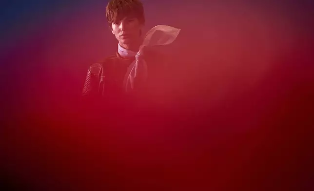 A model wears a design by Palomo backstage before the brand's show at Fashion Week in Madrid, Spain, Wednesday, Sept. 17, 2025. (AP Photo/Manu Fernandez)