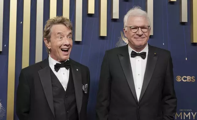 Martin Short, left, and Steve Martin arrive at the 77th Primetime Emmy Awards on Sunday, Sept. 14, 2025, at the Peacock Theater in Los Angeles. (AP Photo/Jae C. Hong)