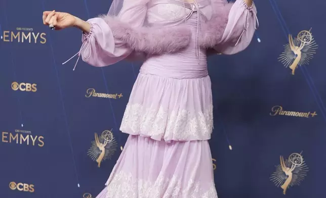 Parker Posey arrives at the 77th Primetime Emmy Awards on Sunday, Sept. 14, 2025, at the Peacock Theater in Los Angeles. (AP Photo/Jae C. Hong)