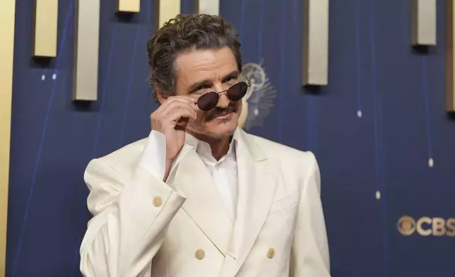 Pedro Pascal arrives at the 77th Primetime Emmy Awards on Sunday, Sept. 14, 2025, at the Peacock Theater in Los Angeles. (AP Photo/Jae C. Hong)
