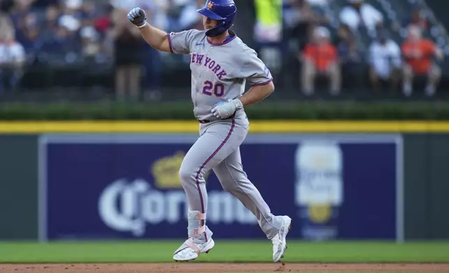 New York Mets' Pete Alonso reacts while running the bases after hitting a solo home run during the first inning of a baseball game against the Detroit Tigers, Tuesday, Sept. 2, 2025, in Detroit. (AP Photo/Ryan Sun)