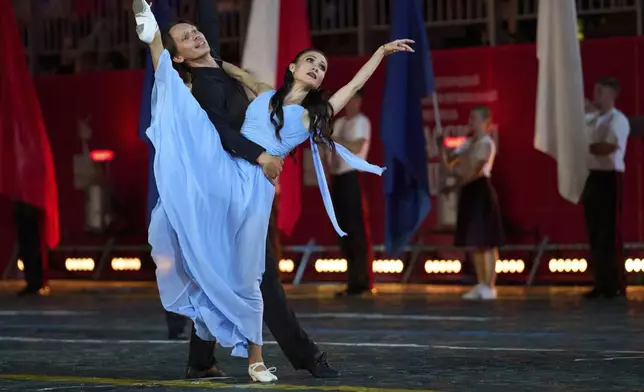 The Central Band of the National Military-Patriotic Center of the Republic of Kazakhstan perform during the closing ceremony of the Spasskaya Tower International Military Music Festival in Red Square in front of the St. Basil Cathedral in Moscow, Russia, on Sunday, Aug. 31, 2025. (AP Photo/Alexander Zemlianichenko)