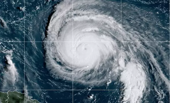 This satellite image provided by NOAA shows Hurricane Humberto on Sunday, Sept. 28, 2025. (NOAA via AP)