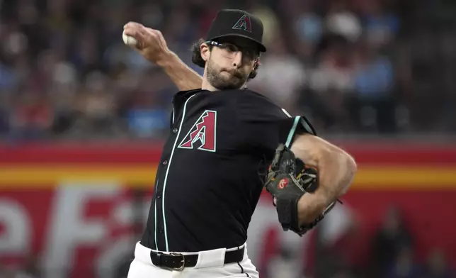Arizona Diamondbacks pitcher Zac Gallen throws against the Philadelphia Phillies in the first inning of a baseball game, Saturday, Sept. 20, 2025, in Phoenix. (AP Photo/Rick Scuteri)