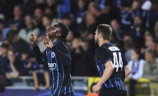Brugge's Mamadou Diakhon, left, celebrates after scoring his sides fourth goal during the Champions League opening phase soccer match between Club Brugge and Monaco at the Jan Breydel Stadium in Bruges, Belgium, Thursday, Sept. 18, 2025. (AP Photo/Omar Havana)