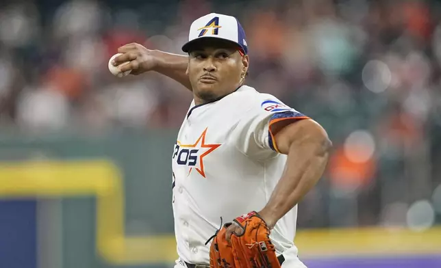 Houston Astros starting pitcher Luis Garcia throws against the Los Angeles Angels during the first inning of a baseball game Monday, Sept. 1, 2025, in Houston. (AP Photo/David J. Phillip)