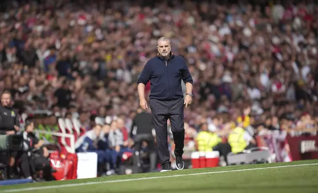 Nottingham Forest's head coach Ange Postecoglou watches the play during the Premier League soccer match between Arsenal and Nottingham Forest in London, Saturday, Sept. 13, 2025. (AP Photo/Kin Cheung)