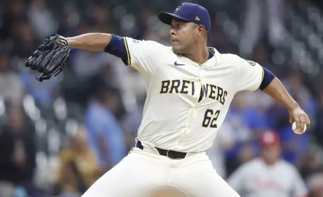 Milwaukee Brewers' Jose Quintana (62) throws to the Philadelphia Phillies during the first inning of a baseball game Wednesday, Sept. 3, 2025, in Milwaukee. (AP Photo/Jeffrey Phelps)