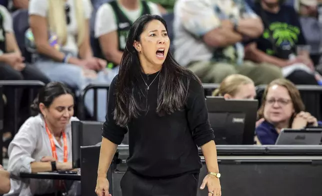 Valkyries head coach Natalie Nakase reacts to a play on the court in the second half as the Golden State Valkyries played the Minnesota Lynx in Game 1 of the WNBA first round playoffs at Target Center in Minneapolis, Minn, on Sunday, Sept. 14, 2025. (Carlos Avila Gonzalez/San Francisco Chronicle via AP)