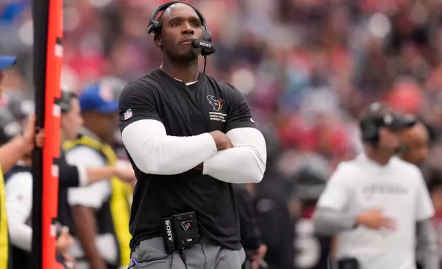 Houston Texans head coach DeMeco Ryans looks onto the field during the second half of an NFL football game against the Tennessee Titans, Sunday, Sept. 28, 2025, in Houston. (AP Photo/Ashley Landis)
