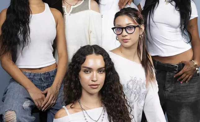 Manon Bannerman, clockwise from left, Yoonchae, Sophia Laforteza, Lara Raj, Megan Skiendiel and Daniela Avanzini, of KATSEYE pose for a portrait on Wednesday, Sept. 3, 2025, in Los Angeles. (Photo by Rebecca Cabage/Invision/AP)