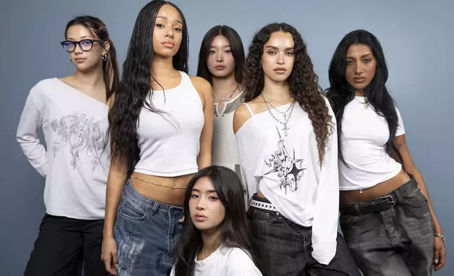 Megan Skiendiel, from left, Manon Bannerman, Sophia Laforteza, foreground center, Yoonchae, Daniela Avanzini and Lara Raj of KATSEYE pose for a portrait on Wednesday, Sept. 3, 2025, in Los Angeles. (Photo by Rebecca Cabage/Invision/AP)