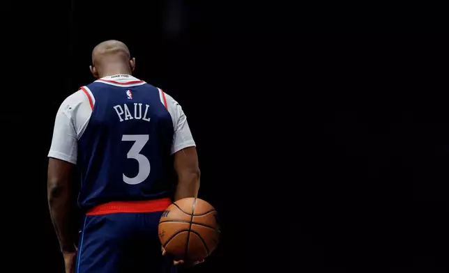 Los Angeles Clippers guard Chris Paul poses during the NBA basketball team's media day Monday, Sept. 29, 2025, in Inglewood, Calif. (AP Photo/Eric Thayer)