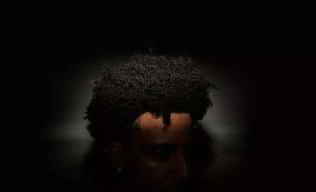 Atlanta Hawks' Jalen Johnson (1) poses for a photograph during an NBA basketball media day on Monday, Sept. 29, 2025, in Atlanta. (AP Photo/Brynn Anderson)