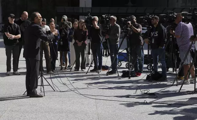 Former U.S. Rep. Luis Gutierrez, left, speaks at a news conference for "Don't Take the Bait" campaign in Chicago, Thursday, Sept. 4, 2025. (AP Photo/Nam Y. Huh)