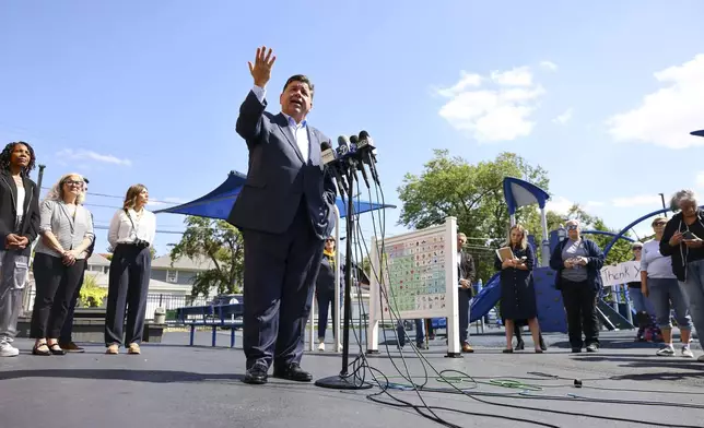 Gov. JB Pritzker speaks with reporters after visiting Prairie Oak Elementary School in Berwyn, Ill., Thursday, Sept. 4, 2025. (Anthony Vazquez/Chicago Sun-Times via AP, Pool)